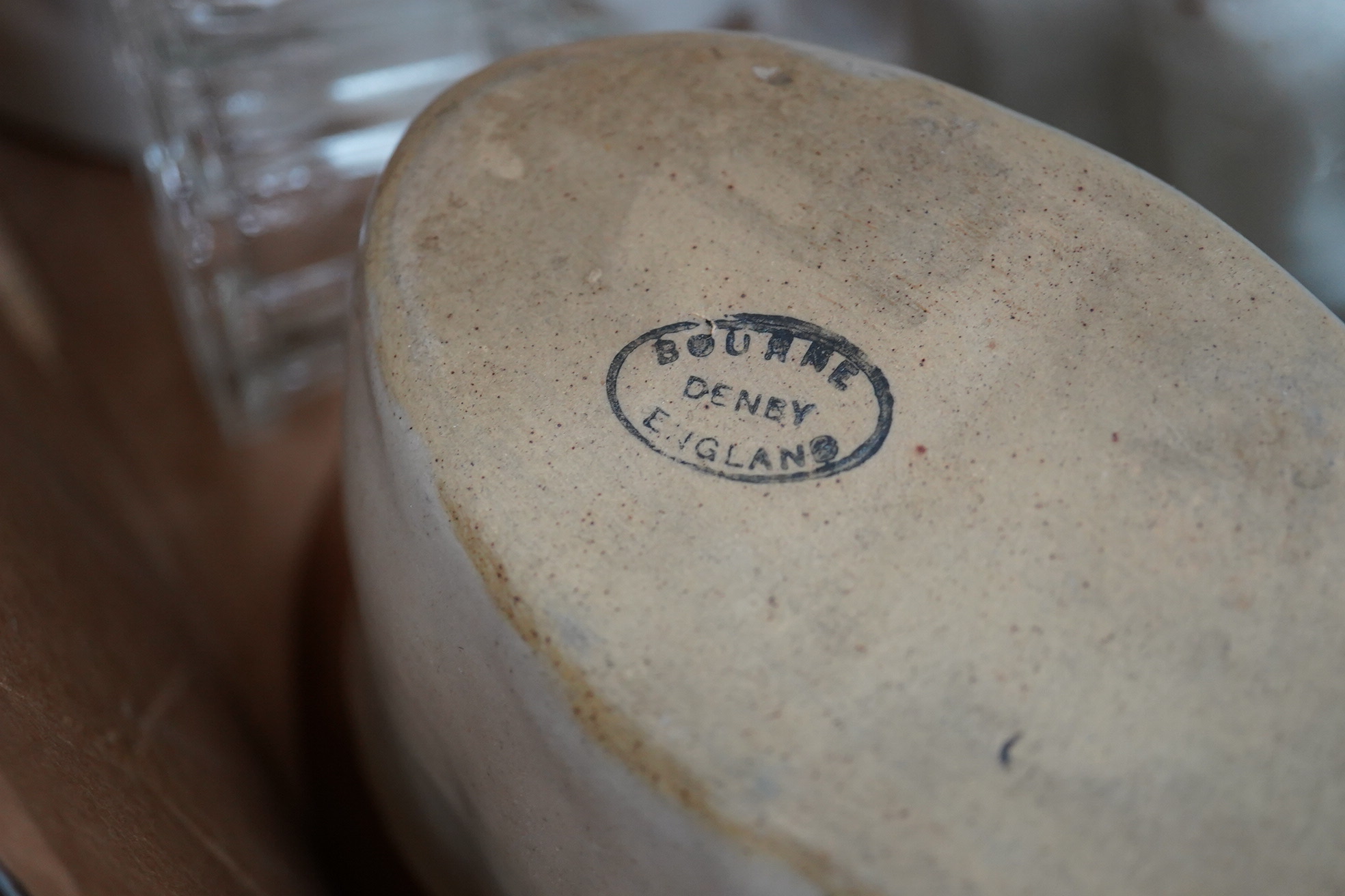A collection of mostly Victorian ceramic and later glass and metal jelly moulds